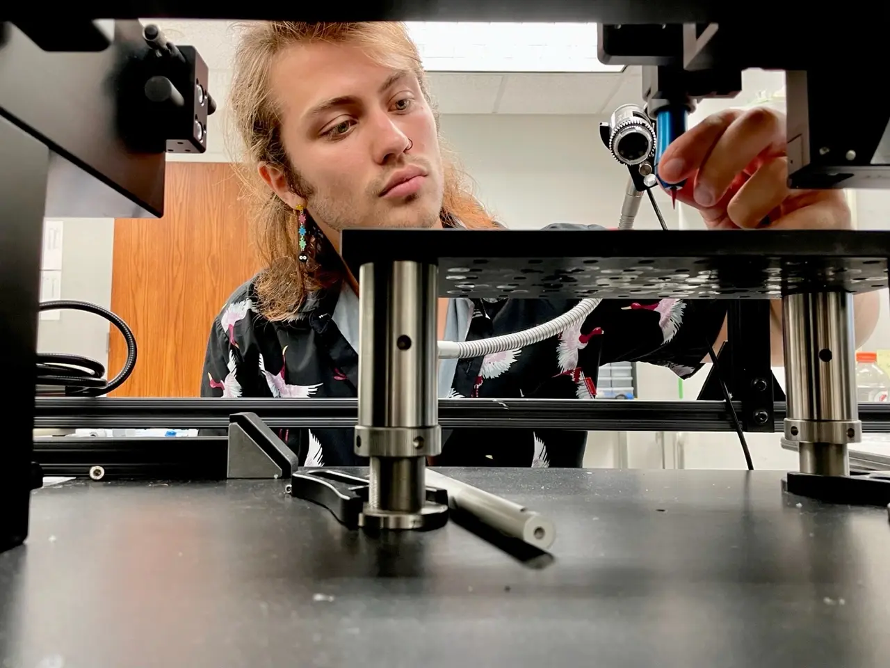 Phillip Glass works with a 3D printer